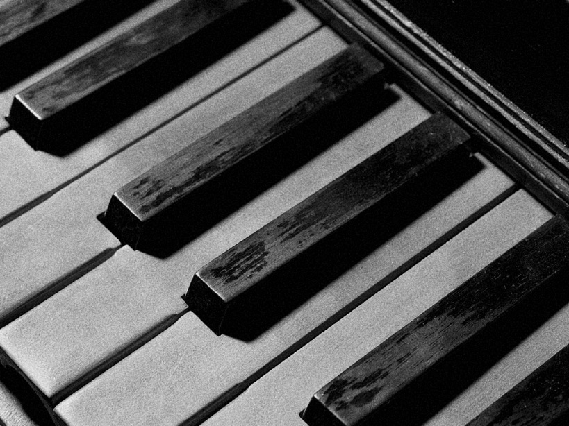 Close-up photo of old piano keys